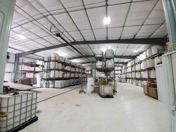 Racked biomass storage warehouse